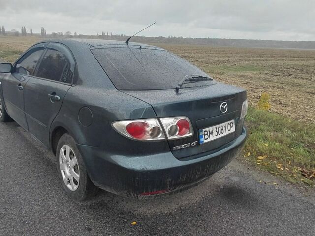 Зеленый Мазда 6, объемом двигателя 2 л и пробегом 267 тыс. км за 1650 $, фото 1 на Automoto.ua