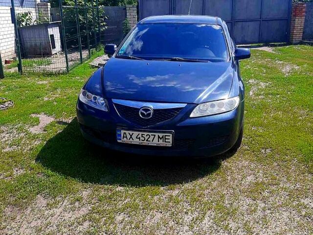 Зелений Мазда 6, об'ємом двигуна 2 л та пробігом 300 тис. км за 2000 $, фото 1 на Automoto.ua