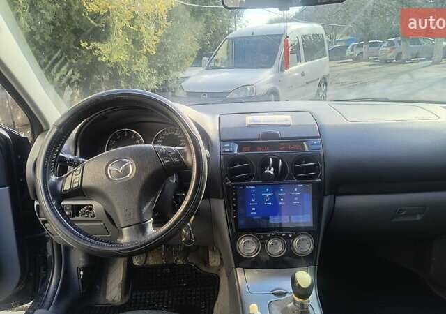 Зелений Мазда 6, об'ємом двигуна 2 л та пробігом 335 тис. км за 5000 $, фото 1 на Automoto.ua