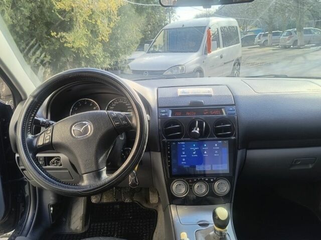 Зеленый Мазда 6, объемом двигателя 2 л и пробегом 336 тыс. км за 5000 $, фото 1 на Automoto.ua