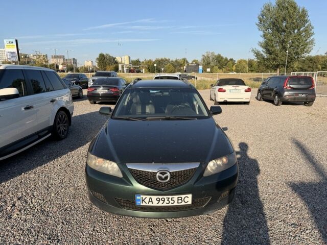 Зеленый Мазда 6, объемом двигателя 2 л и пробегом 250 тыс. км за 3299 $, фото 1 на Automoto.ua