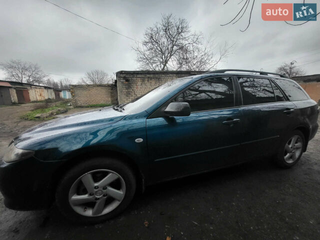 Зеленый Мазда 6, объемом двигателя 1.8 л и пробегом 310 тыс. км за 4900 $, фото 1 на Automoto.ua