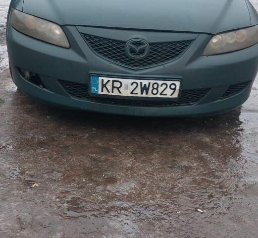Зеленый Мазда 6, объемом двигателя 2 л и пробегом 354 тыс. км за 1200 $, фото 1 на Automoto.ua