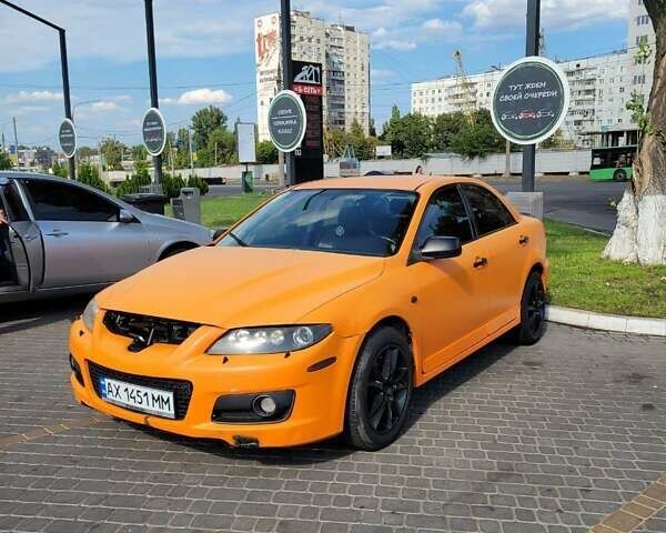 Оранжевый Мазда 6, объемом двигателя 2.26 л и пробегом 177 тыс. км за 4200 $, фото 1 на Automoto.ua