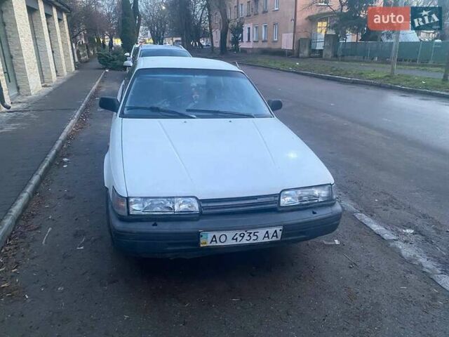 Білий Мазда 626, об'ємом двигуна 2 л та пробігом 250 тис. км за 700 $, фото 1 на Automoto.ua