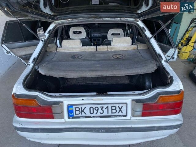 Белый Мазда 626, объемом двигателя 2 л и пробегом 400 тыс. км за 1000 $, фото 1 на Automoto.ua