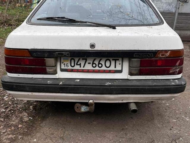 Белый Мазда 626, объемом двигателя 2.02 л и пробегом 200 тыс. км за 600 $, фото 1 на Automoto.ua