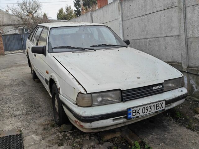 Белый Мазда 626, объемом двигателя 2 л и пробегом 1 тыс. км за 400 $, фото 1 на Automoto.ua