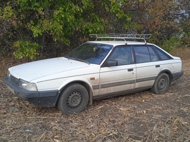 Білий Мазда 626, об'ємом двигуна 2 л та пробігом 3 тис. км за 16000 $, фото 1 на Automoto.ua