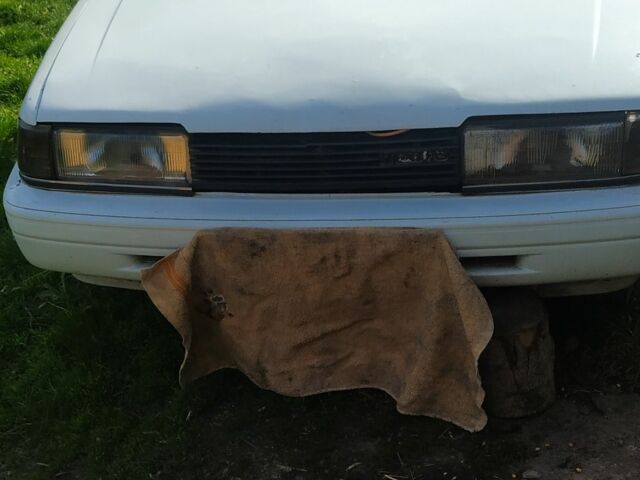 Белый Мазда 626, объемом двигателя 0 л и пробегом 100 тыс. км за 400 $, фото 1 на Automoto.ua