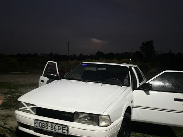 Білий Мазда 626, об'ємом двигуна 2 л та пробігом 320 тис. км за 359 $, фото 1 на Automoto.ua