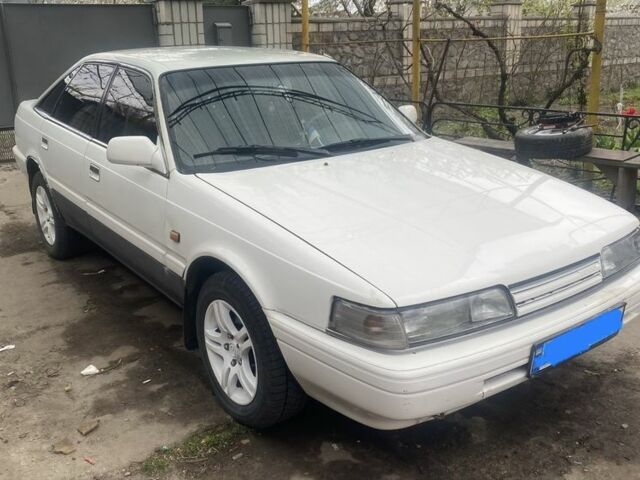 Белый Мазда 626, объемом двигателя 2 л и пробегом 3 тыс. км за 1200 $, фото 1 на Automoto.ua