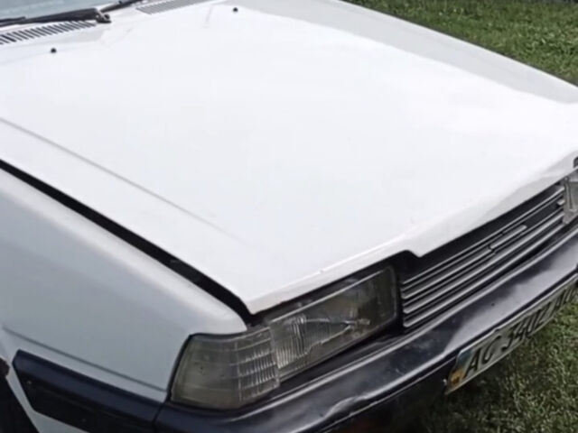 Белый Мазда 626, объемом двигателя 2 л и пробегом 240 тыс. км за 850 $, фото 1 на Automoto.ua