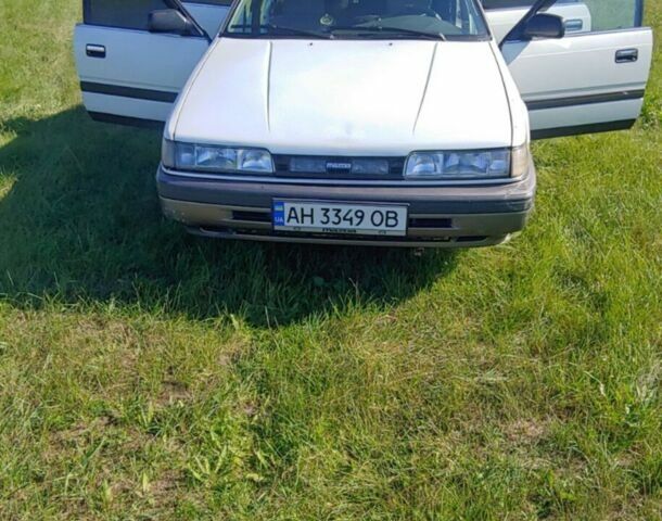 Белый Мазда 626, объемом двигателя 2 л и пробегом 340 тыс. км за 1000 $, фото 1 на Automoto.ua