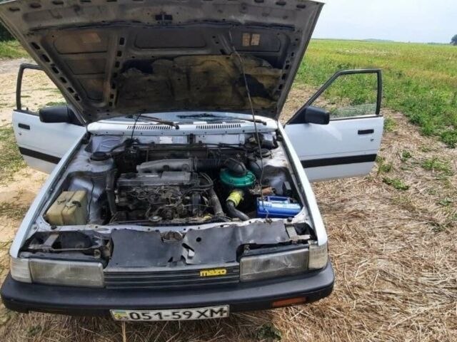 Білий Мазда 626, об'ємом двигуна 2 л та пробігом 200 тис. км за 1500 $, фото 1 на Automoto.ua