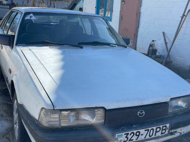 Білий Мазда 626, об'ємом двигуна 2.2 л та пробігом 999 тис. км за 400 $, фото 1 на Automoto.ua