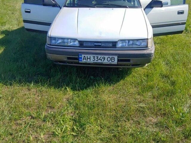 Белый Мазда 626, объемом двигателя 2 л и пробегом 340 тыс. км за 1000 $, фото 1 на Automoto.ua