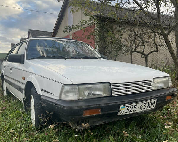 Белый Мазда 626, объемом двигателя 0 л и пробегом 240 тыс. км за 1300 $, фото 1 на Automoto.ua