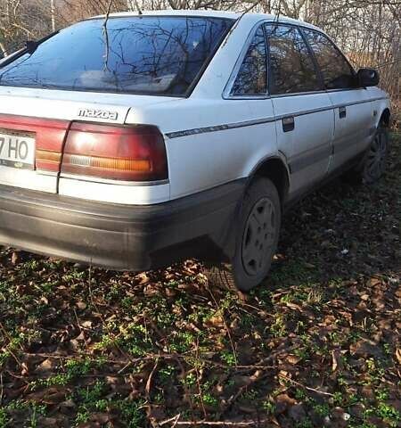 Белый Мазда 626, объемом двигателя 2 л и пробегом 330 тыс. км за 1300 $, фото 1 на Automoto.ua