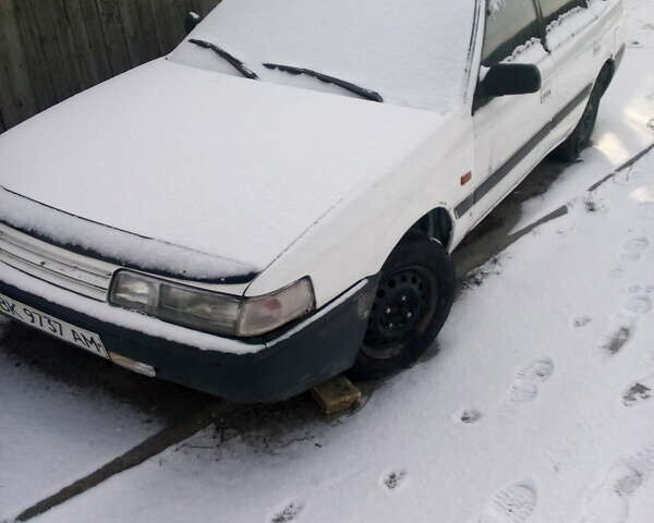 Білий Мазда 626, об'ємом двигуна 2 л та пробігом 320 тис. км за 1100 $, фото 1 на Automoto.ua
