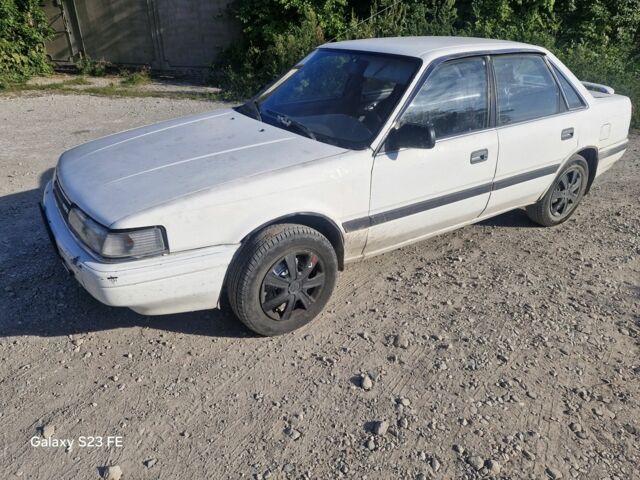 Білий Мазда 626, об'ємом двигуна 1.6 л та пробігом 200 тис. км за 853 $, фото 1 на Automoto.ua