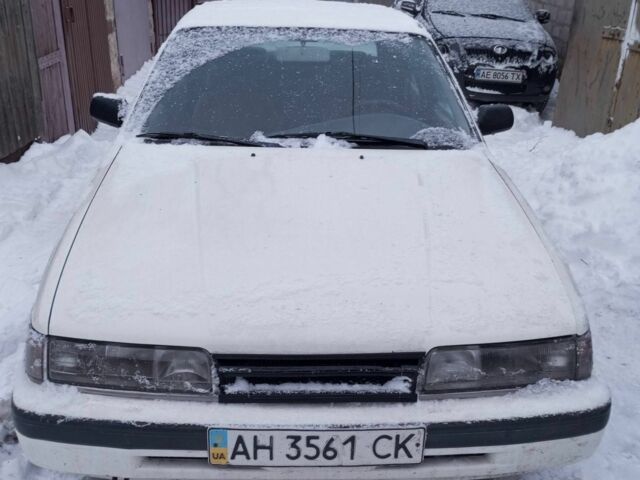Білий Мазда 626, об'ємом двигуна 2 л та пробігом 200 тис. км за 927 $, фото 1 на Automoto.ua