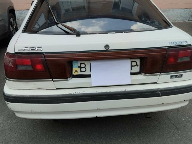 Білий Мазда 626, об'ємом двигуна 2 л та пробігом 480 тис. км за 1002 $, фото 1 на Automoto.ua
