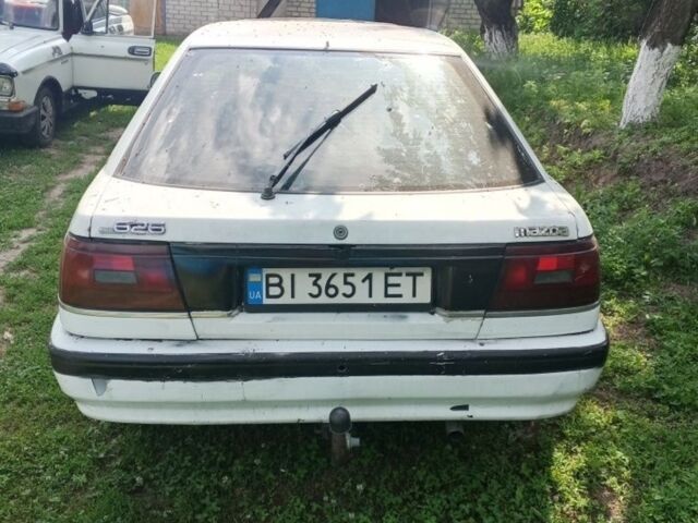 Білий Мазда 626, об'ємом двигуна 2 л та пробігом 200 тис. км за 668 $, фото 1 на Automoto.ua