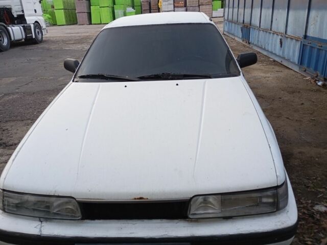 Белый Мазда 626, объемом двигателя 0 л и пробегом 360 тыс. км за 1000 $, фото 1 на Automoto.ua