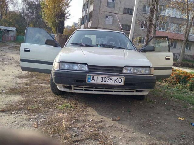 Белый Мазда 626, объемом двигателя 2 л и пробегом 200 тыс. км за 1500 $, фото 1 на Automoto.ua
