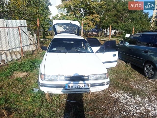 Белый Мазда 626, объемом двигателя 2 л и пробегом 350 тыс. км за 1150 $, фото 1 на Automoto.ua