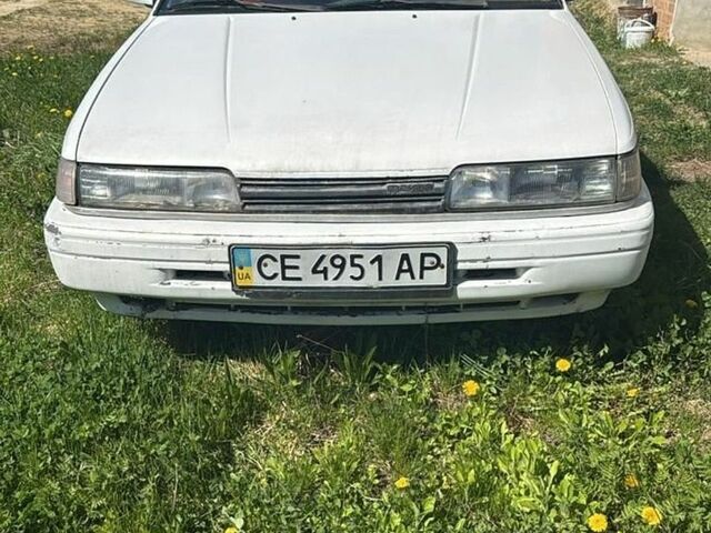 Белый Мазда 626, объемом двигателя 2 л и пробегом 352 тыс. км за 1004 $, фото 1 на Automoto.ua