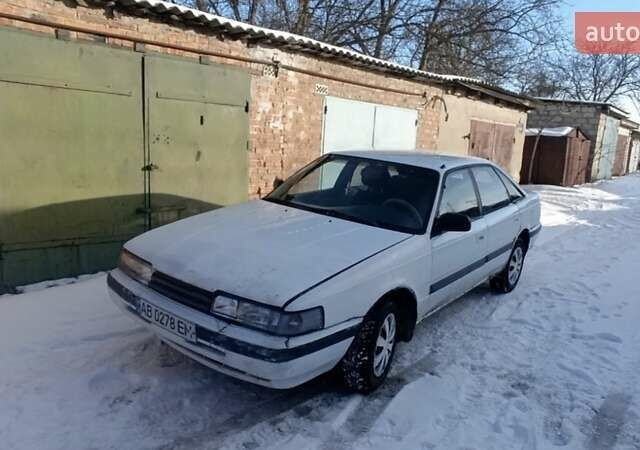 Белый Мазда 626, объемом двигателя 1.8 л и пробегом 300 тыс. км за 800 $, фото 1 на Automoto.ua