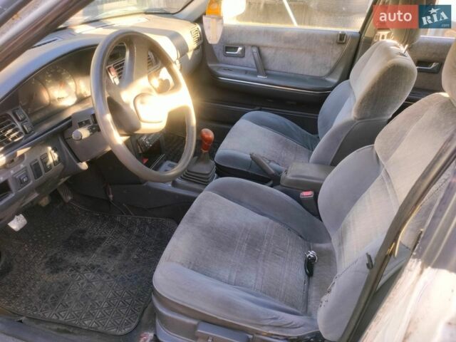 Белый Мазда 626, объемом двигателя 2 л и пробегом 437 тыс. км за 800 $, фото 1 на Automoto.ua