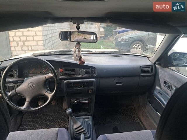 Білий Мазда 626, об'ємом двигуна 1.8 л та пробігом 510 тис. км за 916 $, фото 1 на Automoto.ua