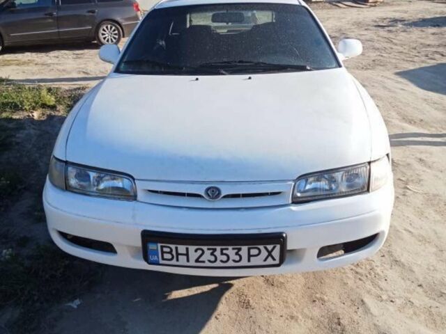 Белый Мазда 626, объемом двигателя 1.8 л и пробегом 500 тыс. км за 1700 $, фото 1 на Automoto.ua