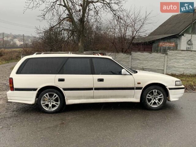 Білий Мазда 626, об'ємом двигуна 2 л та пробігом 300 тис. км за 2100 $, фото 1 на Automoto.ua
