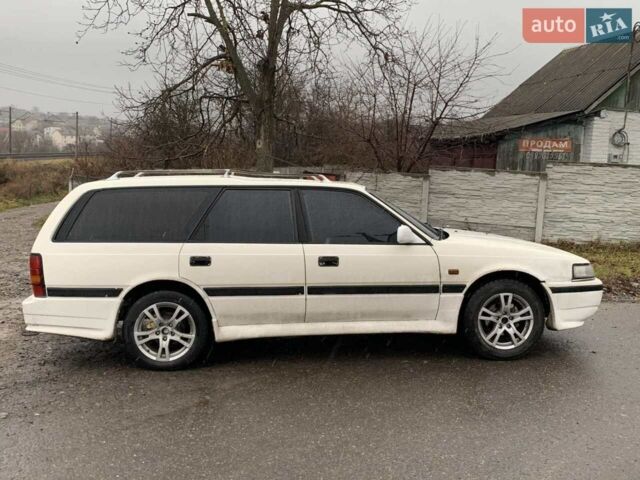 Белый Мазда 626, объемом двигателя 2 л и пробегом 300 тыс. км за 2100 $, фото 1 на Automoto.ua