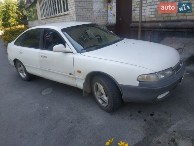 Белый Мазда 626, объемом двигателя 2 л и пробегом 420 тыс. км за 2000 $, фото 1 на Automoto.ua