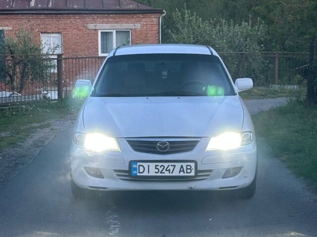 Белый Мазда 626, объемом двигателя 2 л и пробегом 228 тыс. км за 1800 $, фото 1 на Automoto.ua