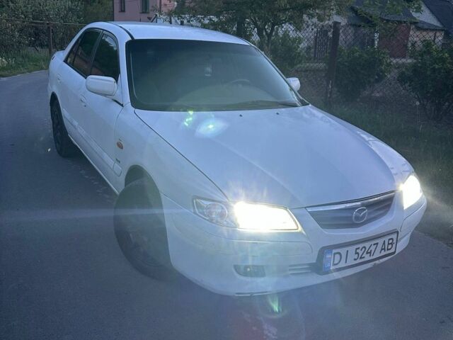 Білий Мазда 626, об'ємом двигуна 2 л та пробігом 228 тис. км за 1500 $, фото 1 на Automoto.ua