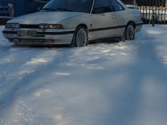 Білий Мазда 626, об'ємом двигуна 2 л та пробігом 300 тис. км за 271 $, фото 1 на Automoto.ua