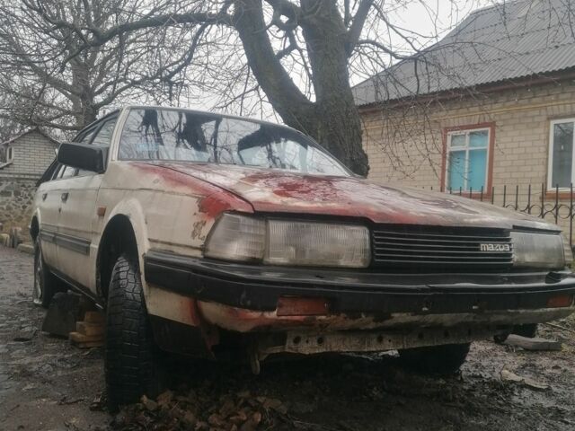 Білий Мазда 626, об'ємом двигуна 2 л та пробігом 300 тис. км за 456 $, фото 1 на Automoto.ua