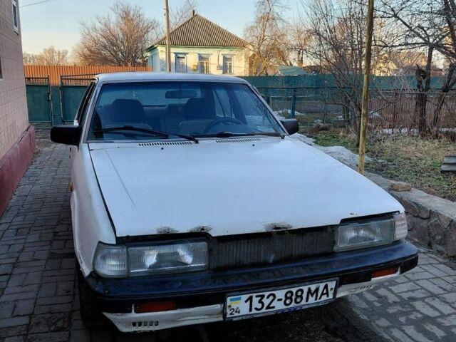 Білий Мазда 626, об'ємом двигуна 1 л та пробігом 385 тис. км за 388 $, фото 1 на Automoto.ua