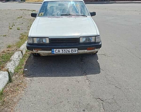 Білий Мазда 626, об'ємом двигуна 1.6 л та пробігом 320 тис. км за 579 $, фото 1 на Automoto.ua