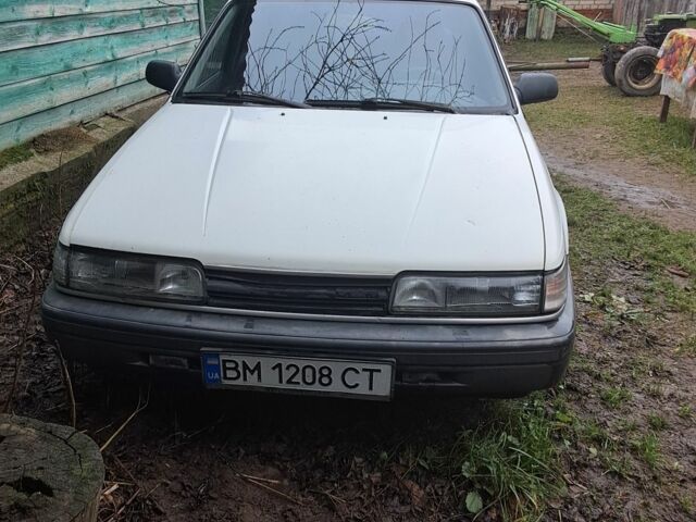 Белый Мазда 626, объемом двигателя 2 л и пробегом 1 тыс. км за 831 $, фото 1 на Automoto.ua