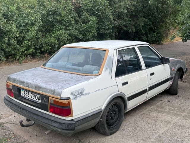 Білий Мазда 626, об'ємом двигуна 2 л та пробігом 300 тис. км за 999 $, фото 1 на Automoto.ua