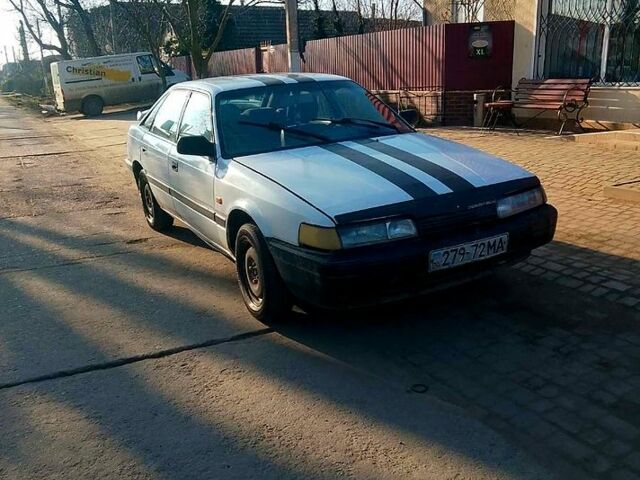 Белый Мазда 626, объемом двигателя 2 л и пробегом 123 тыс. км за 850 $, фото 1 на Automoto.ua