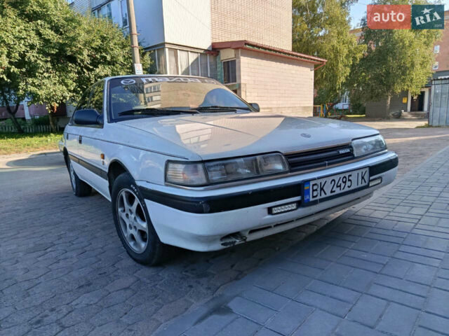 Білий Мазда 626, об'ємом двигуна 2 л та пробігом 499 тис. км за 1200 $, фото 1 на Automoto.ua