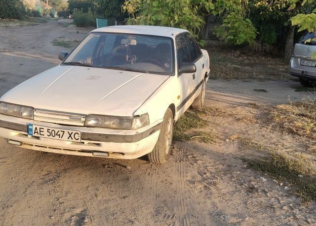 Белый Мазда 626, объемом двигателя 2 л и пробегом 2 тыс. км за 749 $, фото 1 на Automoto.ua